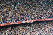 Travel photography:Spectators celebrate the victory of the Supercup 2011 by the FC Barcleona in their home stadium in Camp Nou, Spain