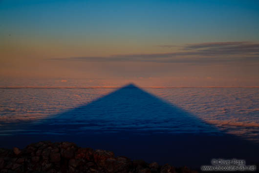 Triangular shadow of Teide Volcano viewed at sunrise from the summit