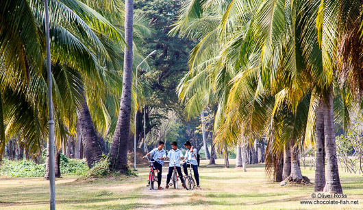 School children exploring the Sukhothai temple complex
