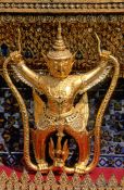 Travel photography:Golden Garuda figure at Wat Phra Kaew in Bangkok, Thailand