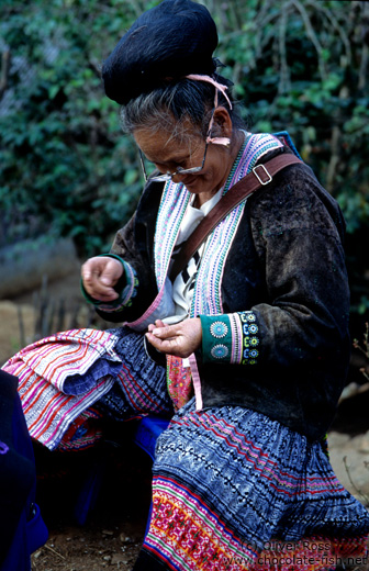 Mhong woman sewing, Chiang Rai province