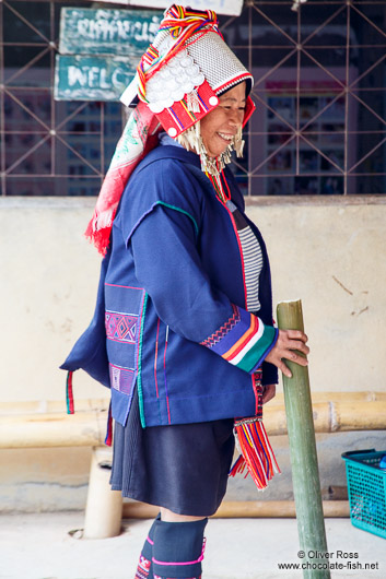 Woman in traditional dress at the Ban Lorcha Akha village