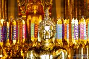 Travel photography:Golden Buddha inside Wat Chedi Luang Worawihan in Chiang Mai, Thailand