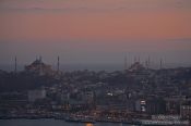 Travel photography:The Ayasofya (Hagia Sofia) left and the Sultanahmet (Blue) Mosque at dusk, Turkey