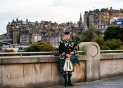 Travel photography:Edinburgh man playing the bagpipes, United Kingdom