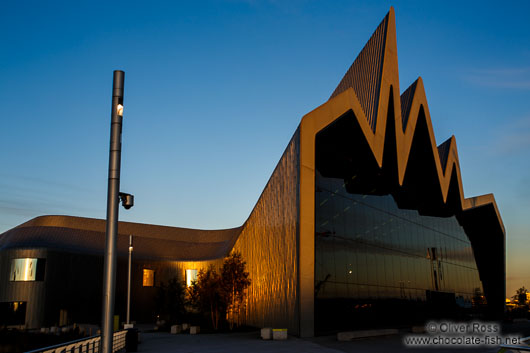 The Glasgow Riverside Museum at sunset with reflection of the Tall Ship Glenlee