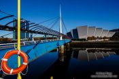 Travel photography:The Clyde Auditorium with Bell`s Bridge across the River Clyde in Glasgow, United Kingdom