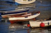 Travel photography:Small rowing boats in a Cornwall harbour at low tide, United Kingdom England