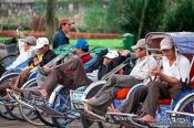 Travel photography:Hue ricksha drivers waiting for customers, Vietnam