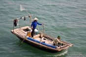Travel photography:Fishing boat in Halong Bay , Vietnam