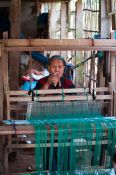 Travel photography:Woman weaving in a village near Chau Doc , Vietnam