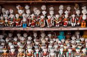 Travel photography:Small figures inside Hanoi´s Temple of Literature , Vietnam