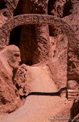 Travel photography:Stone face and arch in the old Inca settlement of Pukará de Quitor near San Pedro de Atacama, Chile