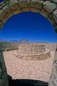 Travel photography:Stone arch and podium on hill near San Pedro de Atacama, Chile